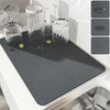 Soakshield ™ - absorbent drain mat